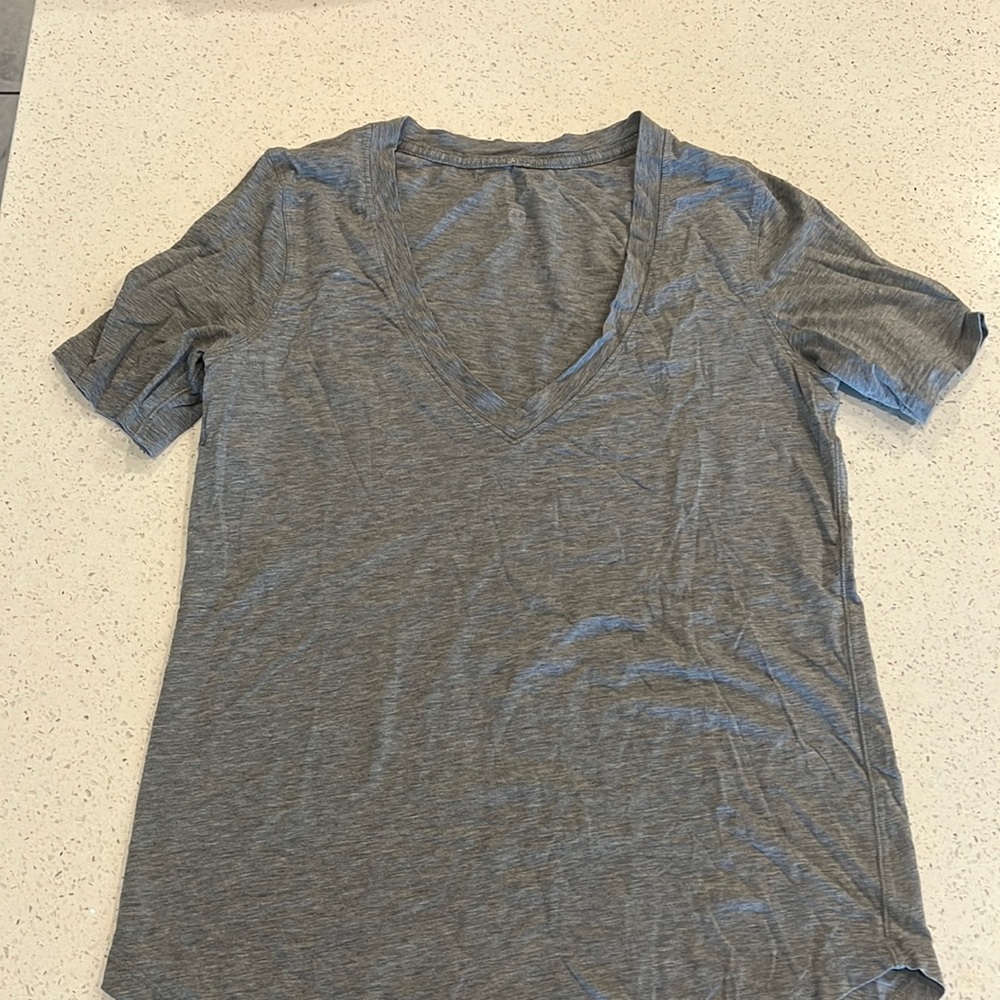 Love V neck shirt in size 4